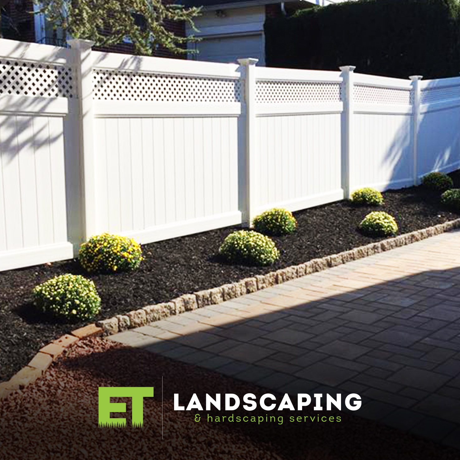 ET Landscaping Project: White Vinyl Fence in Delaware County, PA