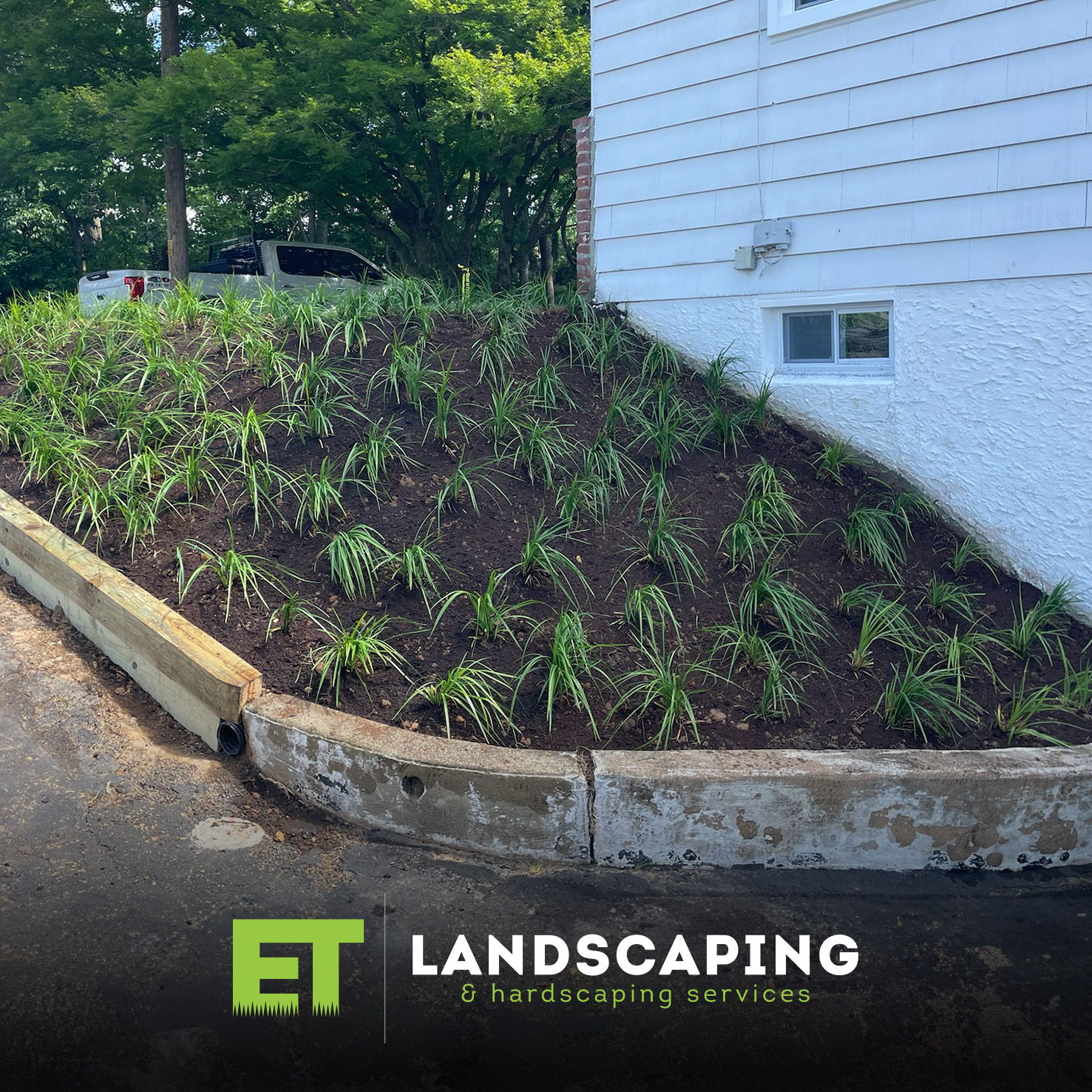 ET Landscaping Project: Sloped Landscape Bed in Delaware County, PA
