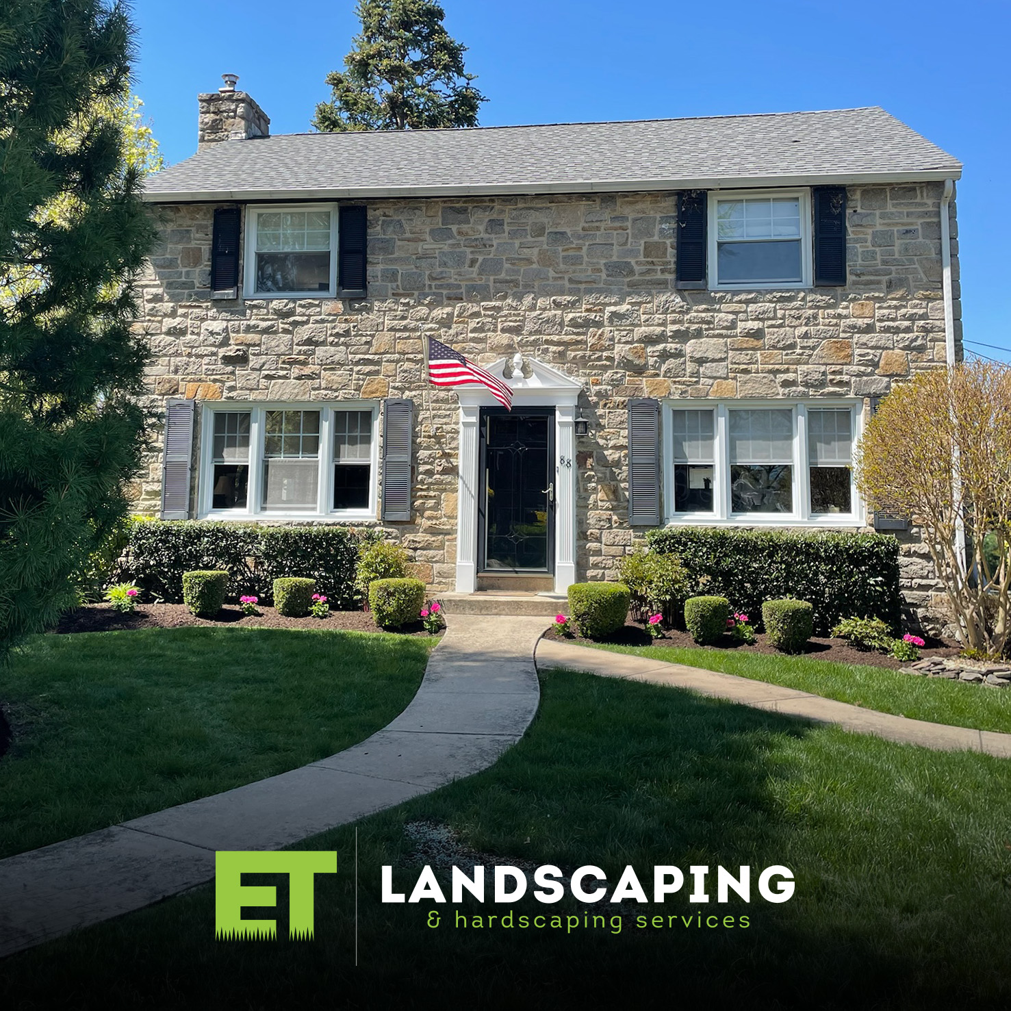 ET Landscaping Project: Stone House Trimmed Bushes in Delaware County, PA