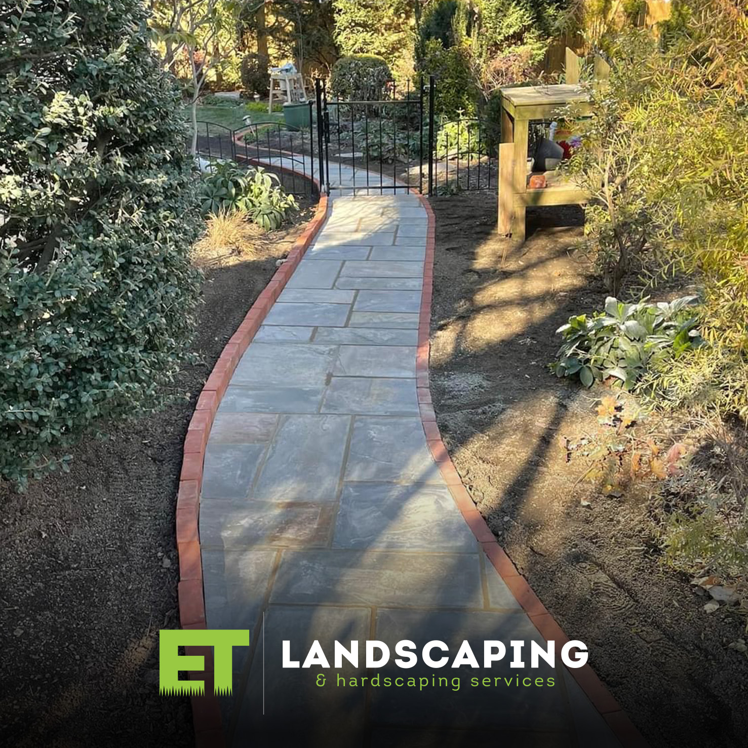 ET Landscaping Project: Flagstone & Brick Walkway in Delaware County, PA